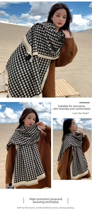 Detailed views of soft houndstooth cashmere-feel scarf paired with a stylish brown coat