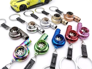 Detailed flat lay of turbocharger car keychains in multiple vibrant metallic colors