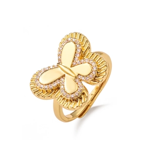 Adjustable 18K gold plated butterfly ring with sparkling zircon stones on white background