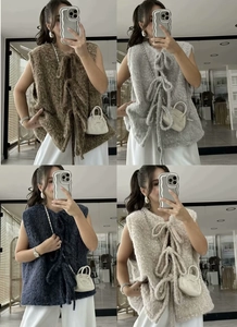 Collage of plush knit vests with tie-front detail in brown, gray, navy, and beige