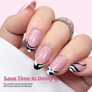 Macro view of pink almond press-on nails with black and white wavy French tips
