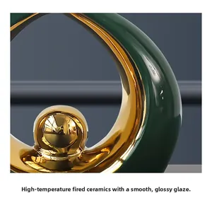Detail of high-temperature fired ceramic decor with green glaze and metallic accents