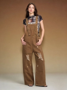 Vintage brown distressed denim overalls with wide-leg cut and ripped detailing
