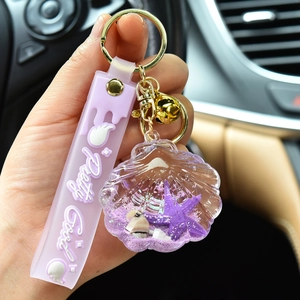 Acrylic starfish floating liquid keychain with purple glitter sand and silicone strap