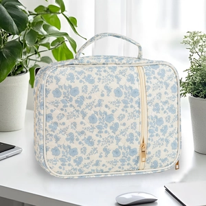 Quilted floral cotton book storage bag with wide handle and gold zipper for travel