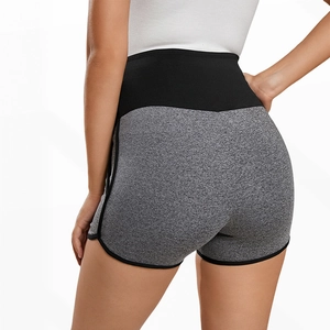 Detail showing the gray marl fabric texture and high-waisted maternity athletic shorts