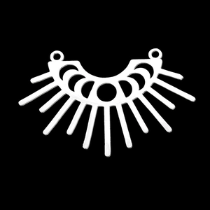 Detailed macro view of silver celestial moon phase pendant with radiant spikes for DIY jewelry