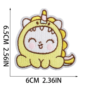 Cute dinosaur unicorn embroidered patch in yellow and white, size 6.5cm by 6cm