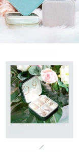Detail view of mini velvet jewelry boxes with multiple storage slots and zip closure