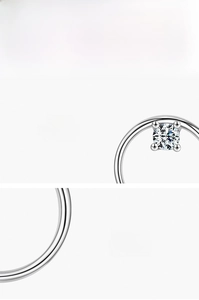 Macro detail of handmade 925 sterling silver geometric earring with 5A grade zircon stone