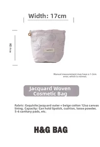 Detail view of swan jacquard cosmetic bag with dimensions 17x14cm and metal zipper