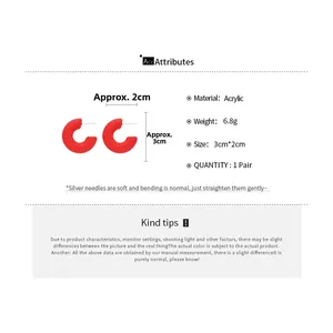 Detailed specs of acrylic C-shaped earrings with silver pins, 3cm by 2cm, weighing 6.8g
