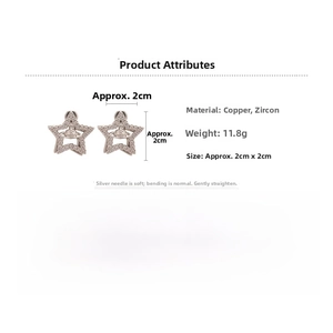 Detailed view of silver star saturn earrings with dimensions 2cm by 2cm and zircon inlay