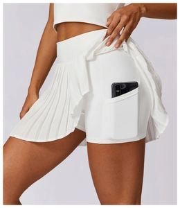 Vue détaillée de la jupe de tennis plissée blanche avec poche latérale pour téléphone