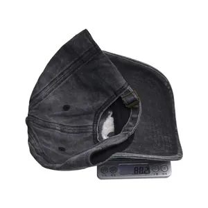 Detailed view of dark gray washed baseball cap weighing 88.2g on a scale