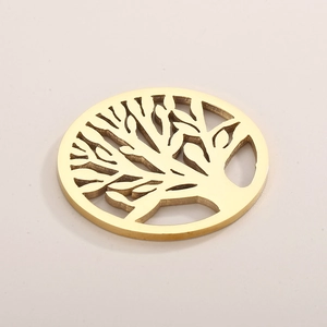 Detailed view of a golden stainless steel tree of life pendant with intricate cutouts