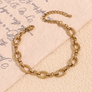 Detail of 14K gold plated stainless steel chunky O-link anklet with lobster clasp and chain