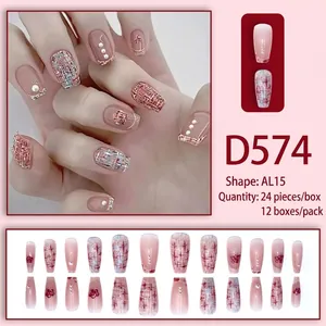 Elegant tweed press-on nails with pearls and gold floral accents in long square shape