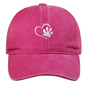 Pink washed baseball cap with embroidered white heart and paw print for pet lovers