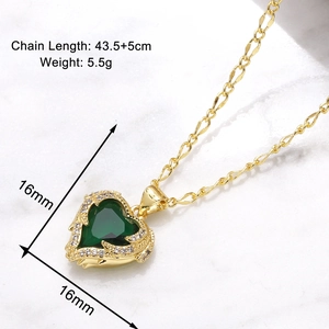 Detail view of heart necklace size 16mm and chain length 43.5cm on white marble
