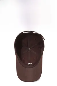 Detail of coffee brown baseball cap interior with metal buckle and breathable cotton fabric