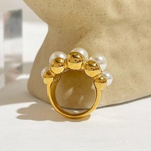Chic multi-layer beaded stainless steel ring with white pearls on artistic stand