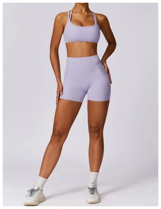 Close-up of light purple yoga set showing u-neck sports bra and high-waisted shorts