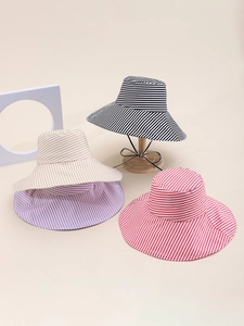 Detailed display of wide-brim striped sun hats in black, yellow, purple, and red options