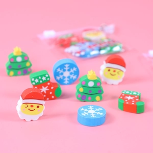 Christmas themed rubber erasers set featuring Santa, tree, and snowflake in pink bag