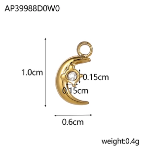 Macro shot of gold moon pendant showing 1.0cm height and 0.6cm width dimensions