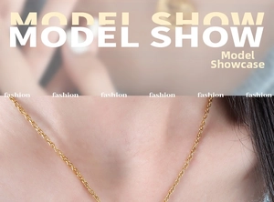 Close-up of a gold sun and moon pendant necklace worn on a model's neck for fashion style