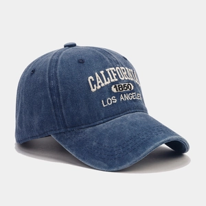 Vintage navy blue denim baseball cap with California embroidery at a 45-degree angle