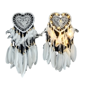 Hollow heart dreamcatcher with warm LED lights and white feathers for wall decor