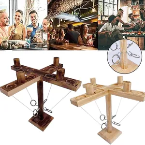Wooden ring toss desktop game set with metal hooks and rings for two-player social interaction