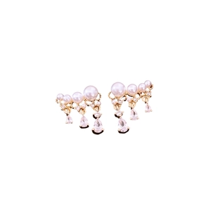 Elegant gold earrings with cascading white pearls and sparkling pear-cut zircon pendants