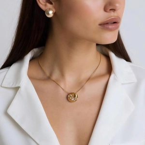 Elegant 18k gold plated stainless steel necklace and earrings set with white crystals