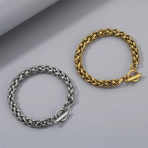 Detail of stainless steel O-chain bracelets in gold and silver with OT toggle clasps