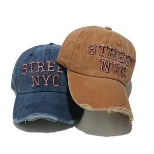 Cappellini NYC in cotone lavato vintage con bordo consumato in blu navy e caramello