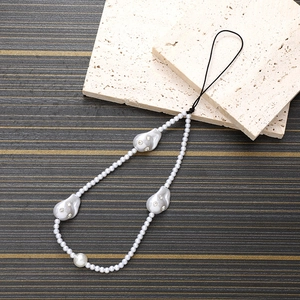 Elegant phone strap with white pearls and rhinestone grey baroque pearls on black cord