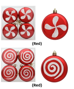 Detailed view of red plastic Christmas ornaments with white glitter windmill patterns