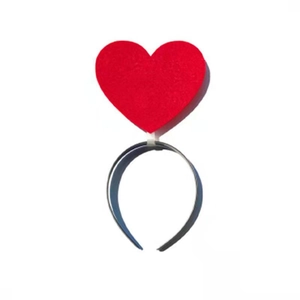 Detail of red heart-shaped felt headpiece on black headband for Halloween party hair