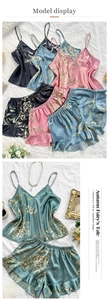 Floral satin camisole and shorts sleepwear set with ruffled hems and delicate plant prints