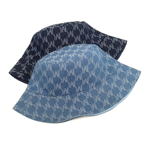 Stylish denim bucket hats with letter M monogram pattern in dark and light blue wash