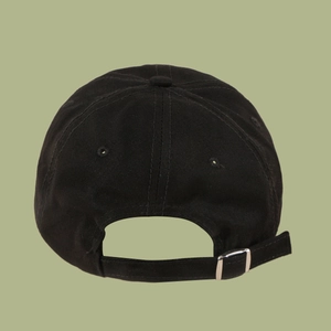 Detail view of black cotton baseball cap back with adjustable silver metal buckle