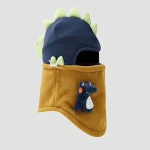 Detail of dinosaur fleece balaclava showing 3D crest and soft thermal material texture
