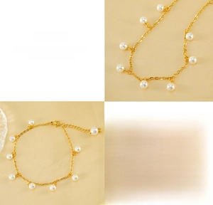 Detail of 18K gold plated stainless steel anklet featuring elegant pearl fringe charms
