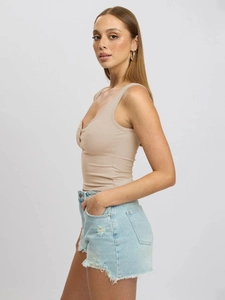 Detail view of the ribbed knit texture and slim fit design on a beige U-neck tank top