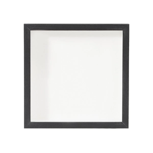 Front view of a deep black shadow box frame with a white mount for travel ticket storage
