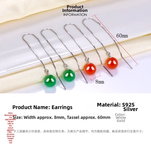 Detail of S925 silver long tassel earrings with 8mm green chalcedony and agate beads
