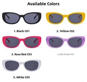 Close-up of retro cat-eye sunglasses showcasing multiple colors like white, pink, and yellow